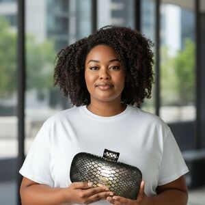 Halston Heritage Black and Gold Clutch